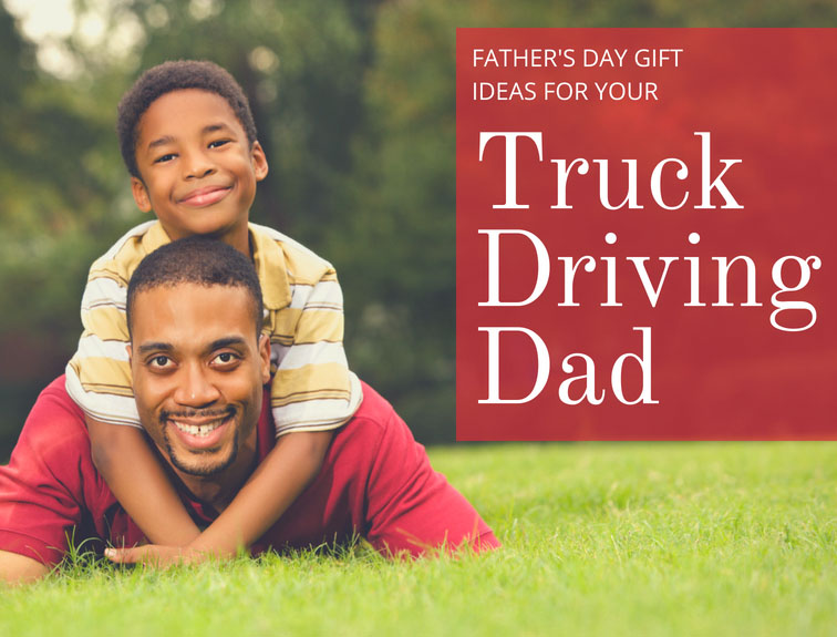 dad and son laying in yard with red box that reads "father's day gift ideas for your truck driving dad"
