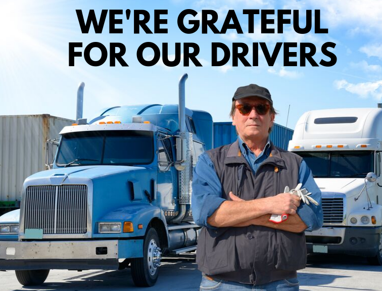 image of man standing in front of blue and shite semi trucks, text at the top reads "we're grateful for our drivers"