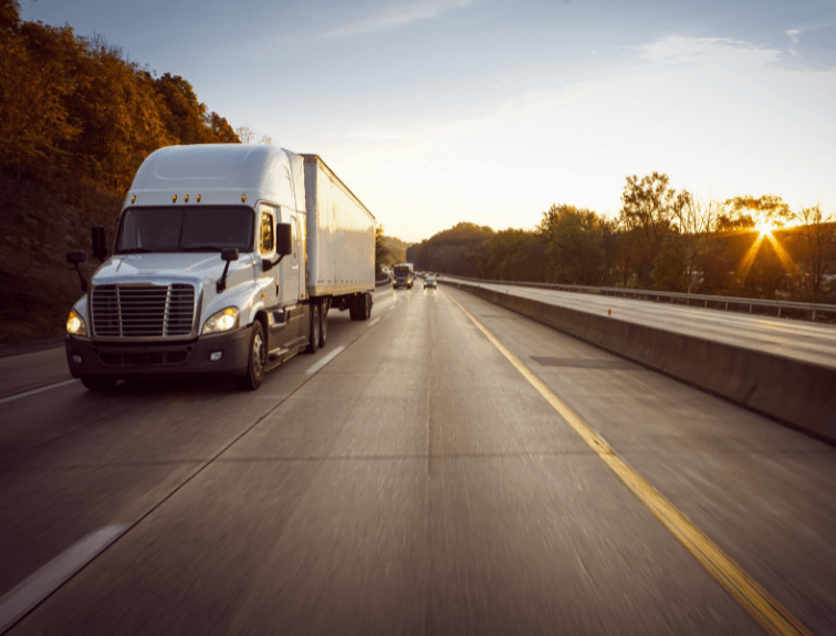 image of White Truck Driving Down Highway