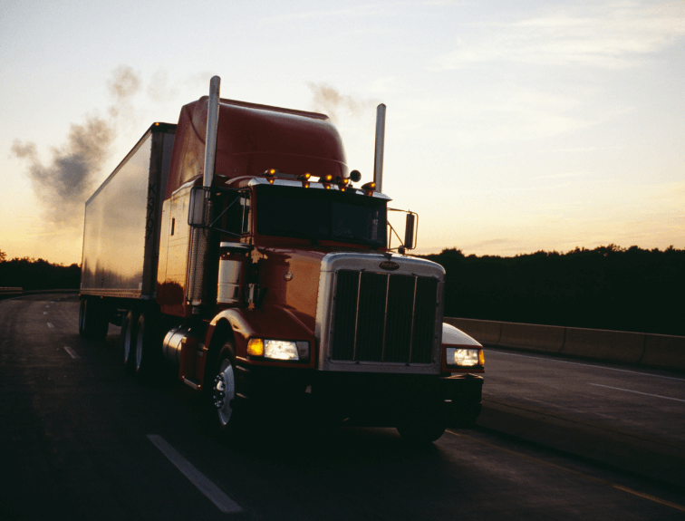 Image of Truck Driving at Night